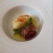 Pulpo braseado, cerezas,parmentier de piñones, judías verdes y aceite perfumado con lavanda.