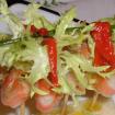 Langostinos tigres,piquillos y escarola escabechada
